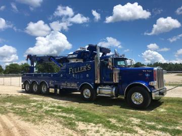 Large blue Fuller Towing truck. Big Papa 